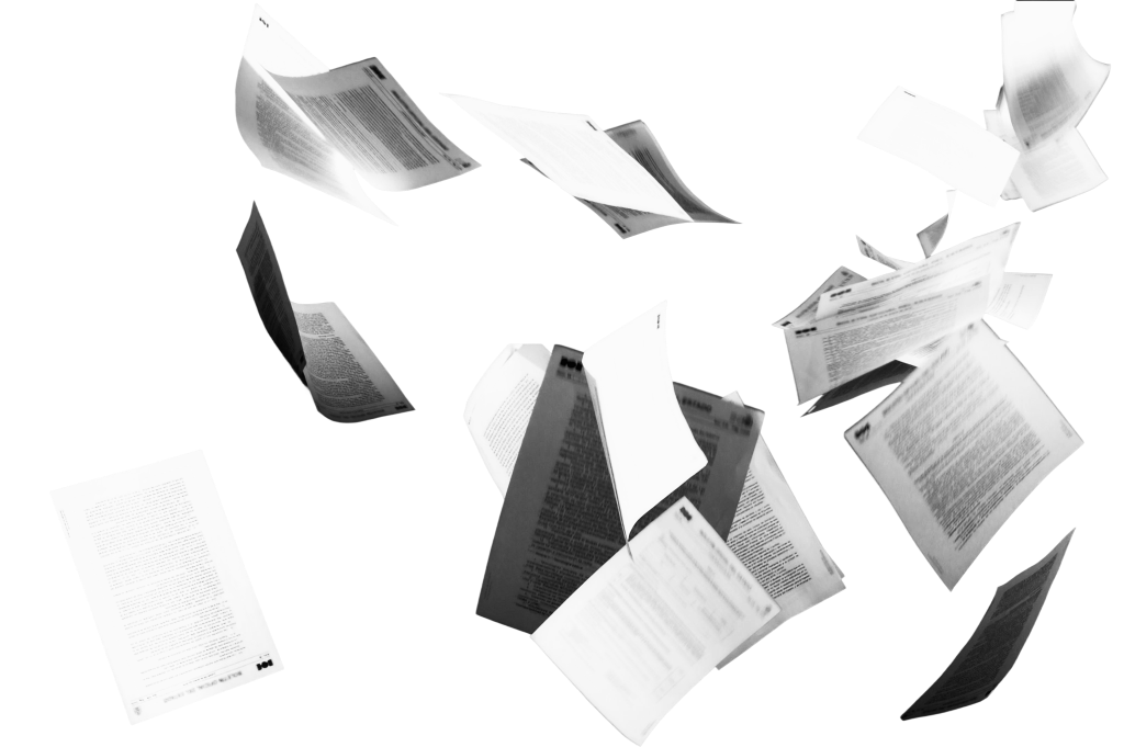 Flying papers representing compliance paperwork